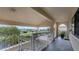 Exterior hallway with access to unit and parking at 450 Bouchelle Dr # 301, New Smyrna Beach, FL 32169