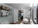 Spa-like bathroom with double vanity and view into bedroom at 450 Bouchelle Dr # 301, New Smyrna Beach, FL 32169