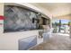 Outdoor kitchen with stainless steel grill and sink, perfect for entertaining at 450 Bouchelle Dr # 301, New Smyrna Beach, FL 32169