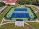 Two well-maintained tennis courts at 5550 Rosewall Cir, Leesburg, FL 34748