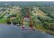 Expansive waterfront lot perfect for a new custom home with lake access at 6118 Dora Dr, Mount Dora, FL 32757