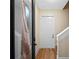 Inviting entryway with hardwood floors and interior door at 6118 Dora Dr, Mount Dora, FL 32757