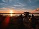 Sunset view from private boat dock at 6118 Dora Dr, Mount Dora, FL 32757