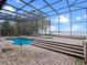 Screened pool and spa with lake view at 6118 Dora Dr, Mount Dora, FL 32757