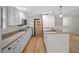 Modern kitchen with light cabinets and new appliances at 6118 Dora Dr, Mount Dora, FL 32757