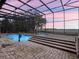 Sunset view from screened pool and spa at 6118 Dora Dr, Mount Dora, FL 32757
