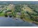 Waterfront property with multiple boathouses and serene lake views at 6118 Dora Dr, Mount Dora, FL 32757