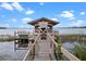 Private boat lift and dock on lake at 6118 Dora Dr, Mount Dora, FL 32757