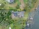 Luxury estate home with a large pool, dock and beautiful landscaping at 6118 Dora Dr, Mount Dora, FL 32757