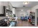 Kitchen with stainless steel appliances and view into dining area at 1109 S Smith Ave, Lakeland, FL 33815