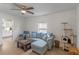 Living room with sectional sofa, coffee table, and cat tree at 1109 S Smith Ave, Lakeland, FL 33815