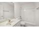 Bathroom with single vanity, tub, and shower at 1711 Augustine Dr, The Villages, FL 32159