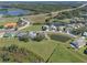 Aerial view of a house and community landscape at 21732 King Henry Ave, Leesburg, FL 34748
