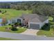 Single-Gathering home with a screened-in patio and pond view at 21732 King Henry Ave, Leesburg, FL 34748