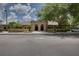 Community building featuring attractive exterior and landscaping at 21732 King Henry Ave, Leesburg, FL 34748