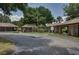 Community mailbox area with multiple units and landscaped surroundings at 21732 King Henry Ave, Leesburg, FL 34748