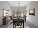 Elegant dining room with a formal table setting at 21732 King Henry Ave, Leesburg, FL 34748