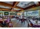 Elegant dining area with ample seating and a view at 21732 King Henry Ave, Leesburg, FL 34748