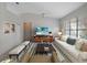 Comfortable living room with large windows at 21732 King Henry Ave, Leesburg, FL 34748