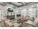 Community lounge with comfortable seating and a large TV at 21732 King Henry Ave, Leesburg, FL 34748