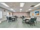 Meeting room with multiple tables and chairs at 21732 King Henry Ave, Leesburg, FL 34748