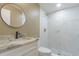 Bathroom with white marble shower and vanity at 2602 Cr 422, Lake Panasoffkee, FL 33538