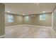 Spacious living room with light wood flooring and neutral walls at 2602 Cr 422, Lake Panasoffkee, FL 33538