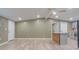 Spacious living room with light wood flooring and neutral walls at 2602 Cr 422, Lake Panasoffkee, FL 33538