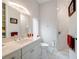 Clean bathroom with single vanity, shower, and marble tile at 39851 & 39855 Darlington Ave, Lady Lake, FL 32159