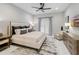 Spacious bedroom with king-size bed, large windows and neutral decor at 39851 & 39855 Darlington Ave, Lady Lake, FL 32159