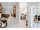 Bright entryway with marble floors and views into the kitchen and living room at 39851 & 39855 Darlington Ave, Lady Lake, FL 32159