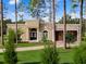 Single story home with two car garage and circular driveway at 39851 & 39855 Darlington Ave, Lady Lake, FL 32159