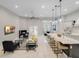 Modern kitchen with white cabinets, marble countertops, and an island at 39851 & 39855 Darlington Ave, Lady Lake, FL 32159