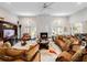 Spacious living room with a marble fireplace and comfortable seating at 39851 & 39855 Darlington Ave, Lady Lake, FL 32159