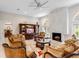 Open living area with built-in entertainment center and ample seating at 39851 & 39855 Darlington Ave, Lady Lake, FL 32159
