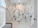 Large walk-in shower with marble tile and modern fixtures at 39851 & 39855 Darlington Ave, Lady Lake, FL 32159