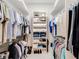 Spacious walk-in closet with ample shelving and hanging space at 39851 & 39855 Darlington Ave, Lady Lake, FL 32159