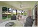 Sunroom with view of the backyard and plenty of natural light at 5416 Essex Ct, Leesburg, FL 34748