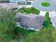 Aerial view of the property, highlighting its location and landscape at 5416 Essex Ct, Leesburg, FL 34748