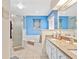 Bathroom with double vanity, soaking tub, and separate shower at 5416 Essex Ct, Leesburg, FL 34748