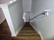 Indoor staircase with wood-look flooring at 652 Chelsea Dr, Davenport, FL 33897