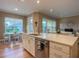 Kitchen island with sink and dishwasher,breakfast nook at 1010 Nantucket Sound, Mount Dora, FL 32757