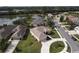 Home with circular driveway and lake view at 1010 Nantucket Sound, Mount Dora, FL 32757