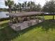 Community pergola provides a shady seating area at 1010 Nantucket Sound, Mount Dora, FL 32757