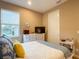 Well-lit bedroom with a queen bed and ample closet space at 1010 Nantucket Sound, Mount Dora, FL 32757