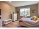 Bedroom with double bed, dresser, and a bench at 1010 Nantucket Sound, Mount Dora, FL 32757