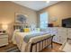 Bright bedroom with a comfortable bed and plenty of storage at 1010 Nantucket Sound, Mount Dora, FL 32757