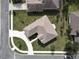 Property overview showing house and landscaping at 1010 Nantucket Sound, Mount Dora, FL 32757