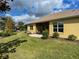 Spacious backyard with patio and lush lawn at 1010 Nantucket Sound, Mount Dora, FL 32757