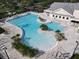Community pool with lap lanes and a spa at 1010 Nantucket Sound, Mount Dora, FL 32757